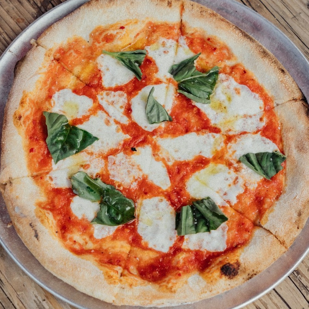 Wood-fired Margherita pizza with blistered crust